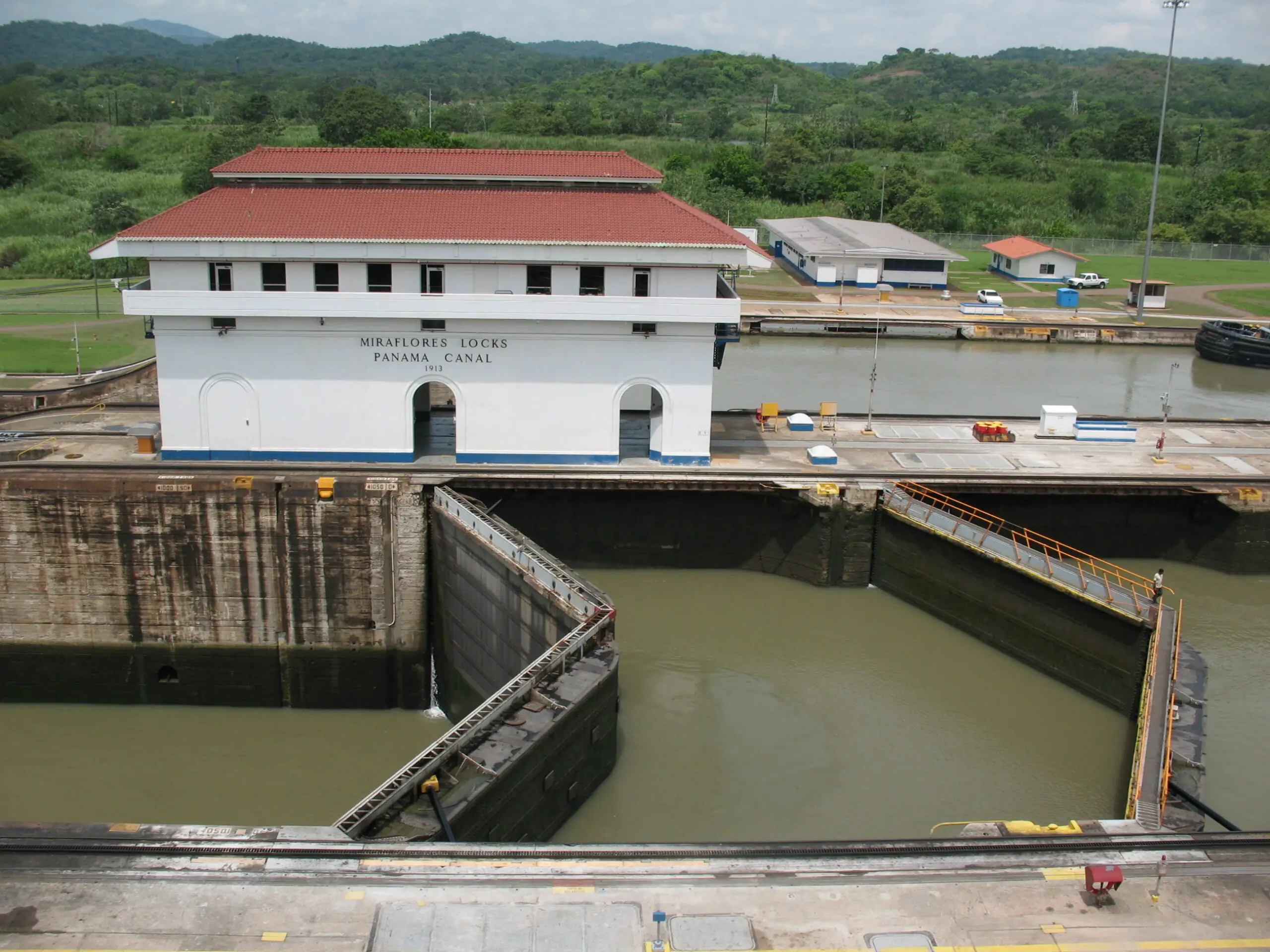 A ship passing through the Miraflores Locks on the Panama Canal.