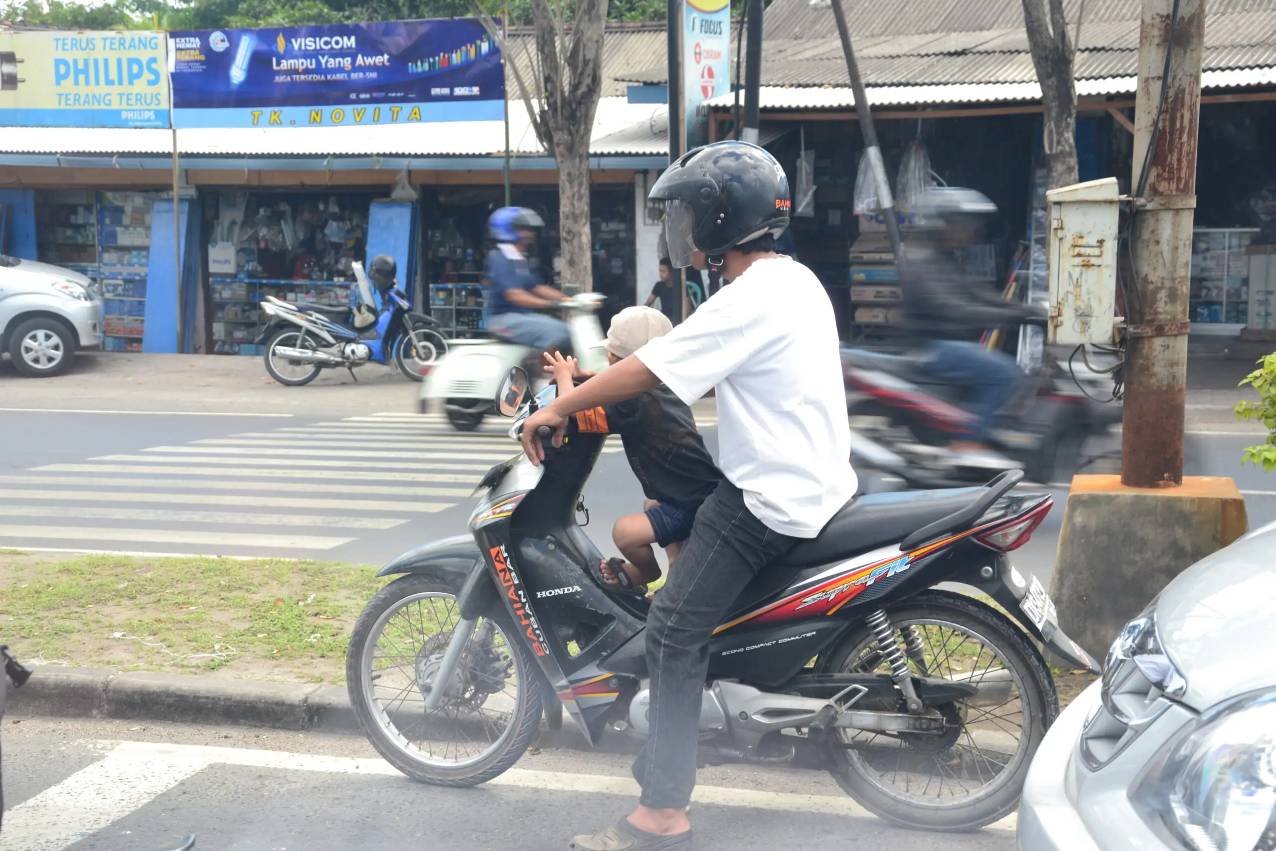 Scooter-clogged street traffic in Bali