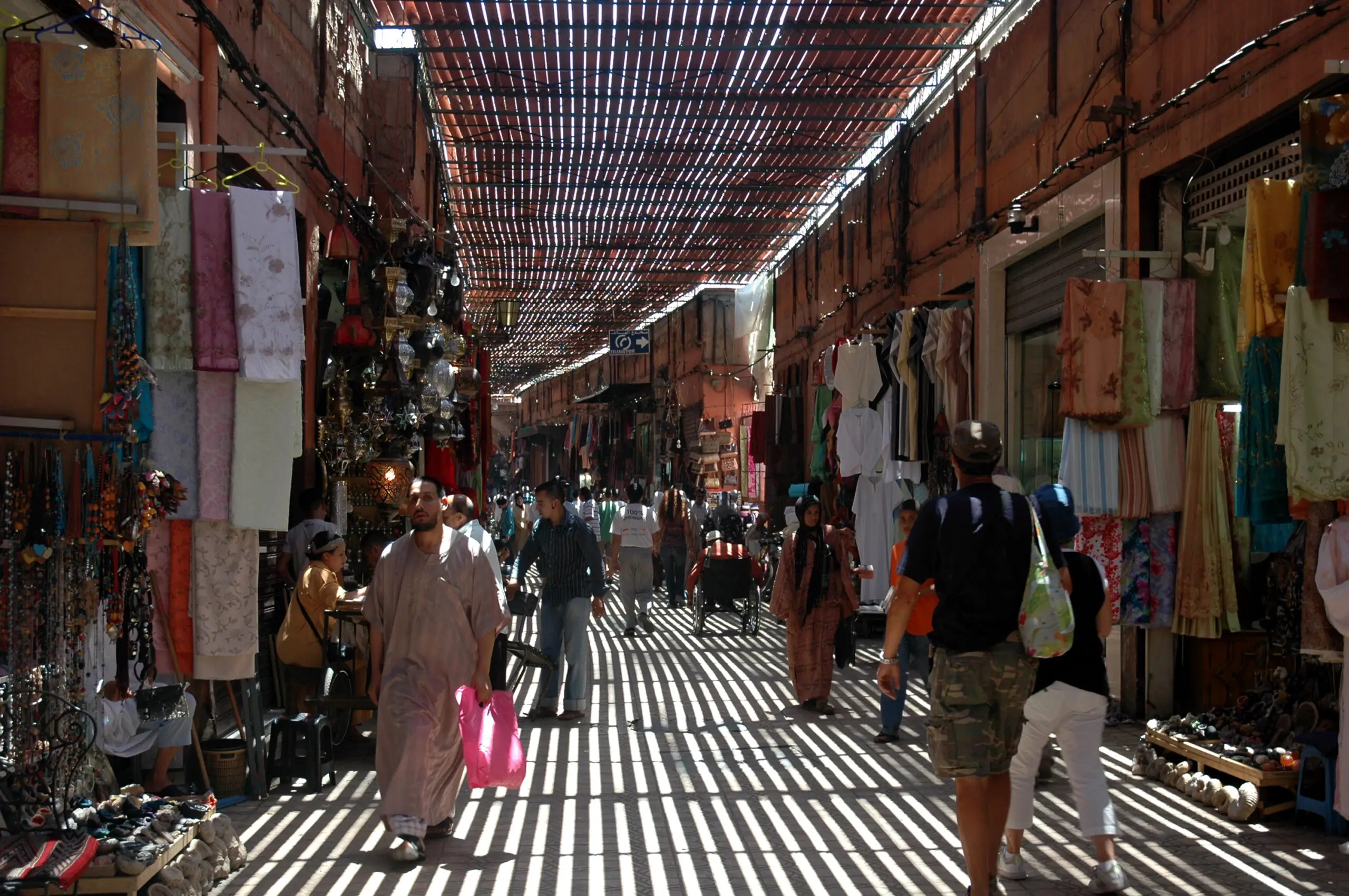 A narrow, crowded souk in the Marrakech medina