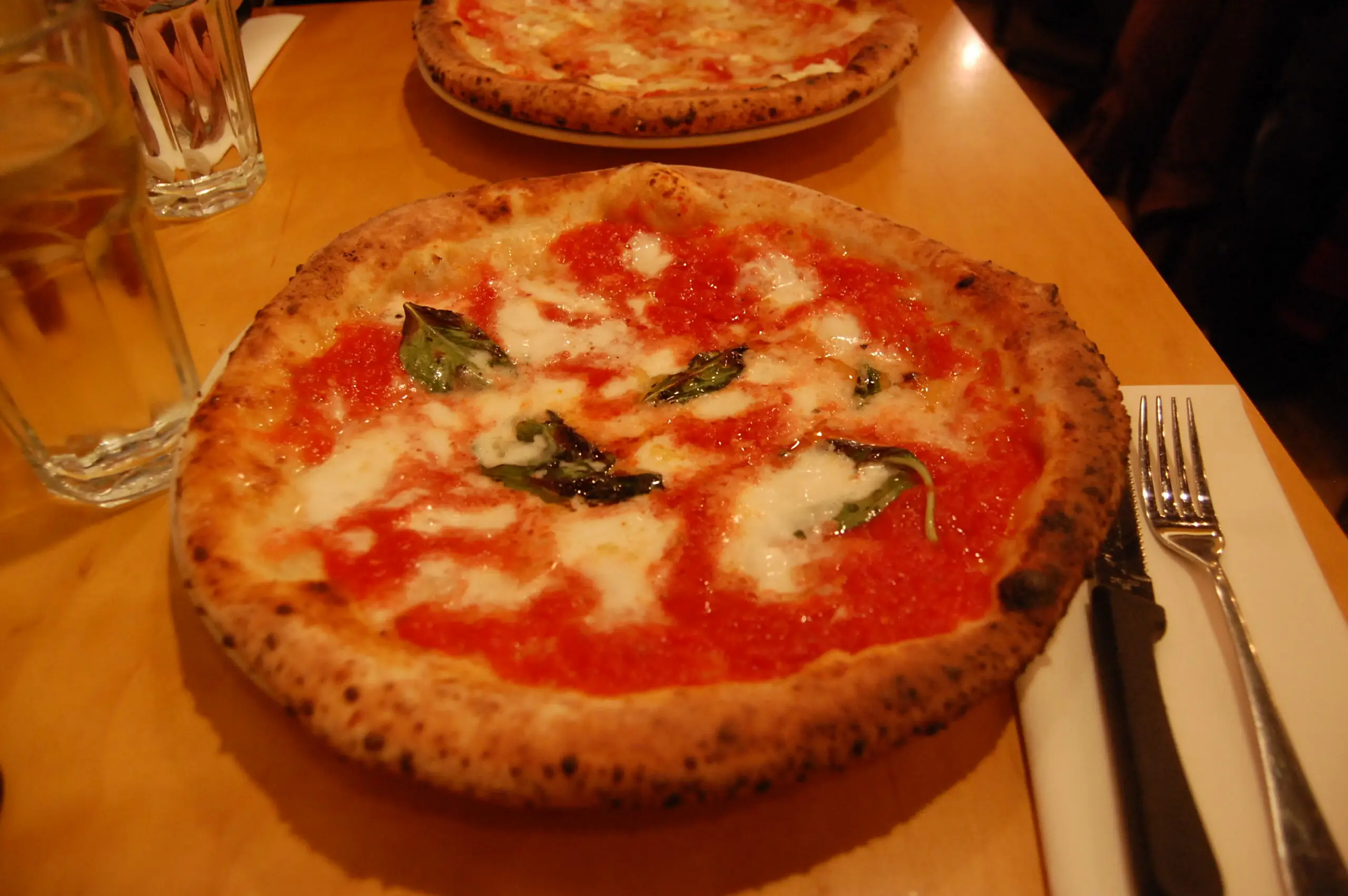 A charred Neapolitan margherita pizza