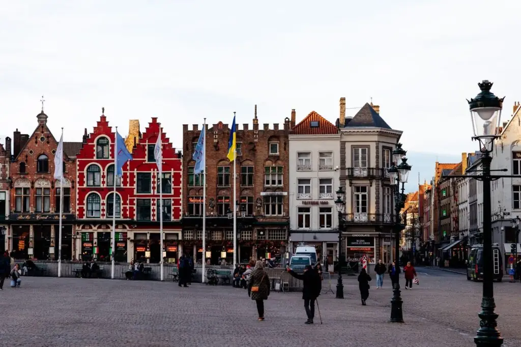 The colorful stepped-gable guild houses lining the Markt square in Bruges