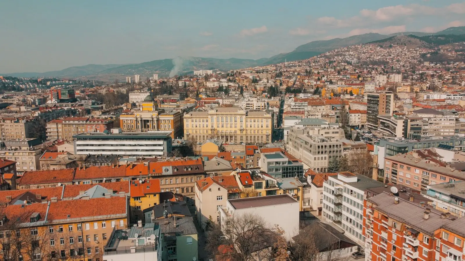 Sarajevo in its valley: red roofs, minarets and the surrounding hills