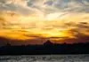 The Reality of Istanbul: The City That Was Three Capitals The minarets and domes of Hagia Sophia and the Blue Mosque silhouetted at sunset over the water