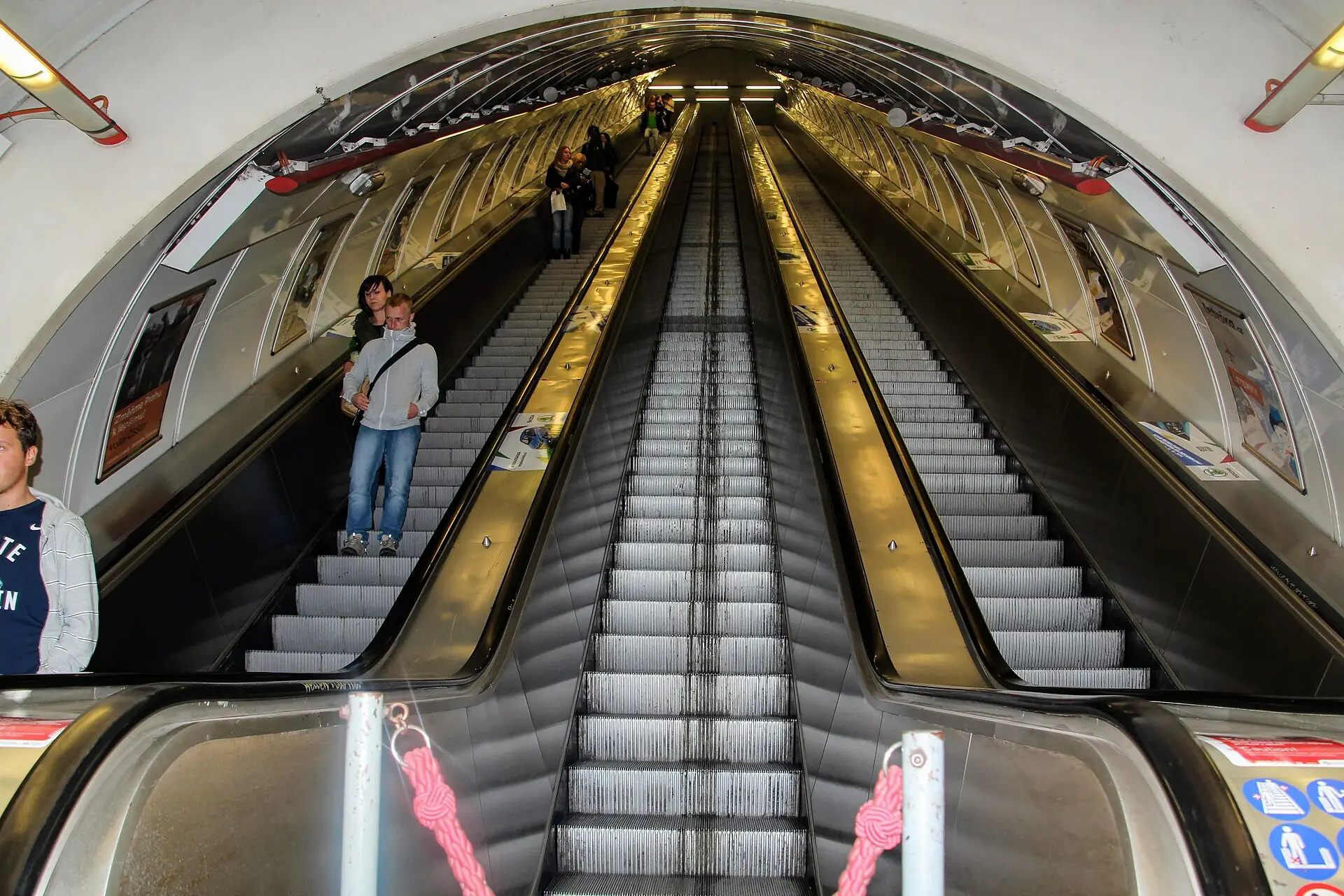 Escalators down to a Prague metro platform