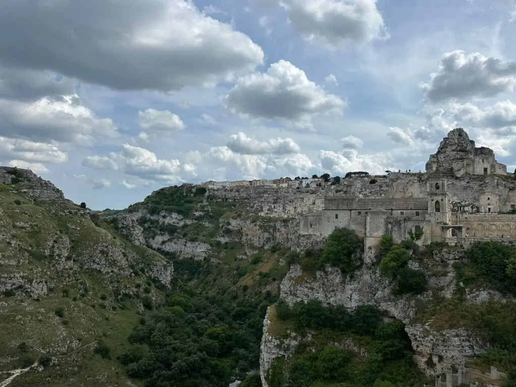 The Gravina gorge below Matera with the old town on the cliff edge