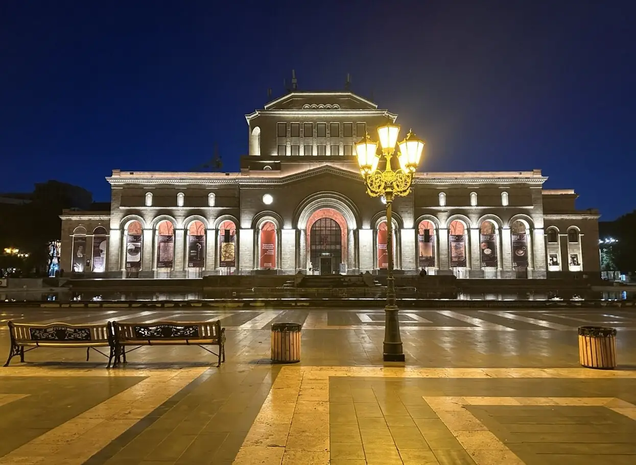 National Gallery and History Museum building illuminated at night on Republic Square in Yerevan
