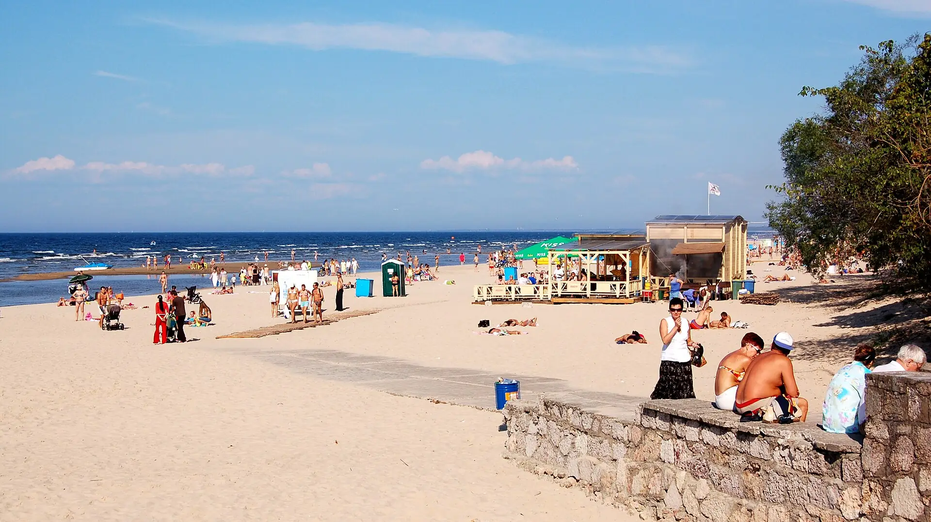 Sandy beach at Jūrmala near Riga with summer visitors