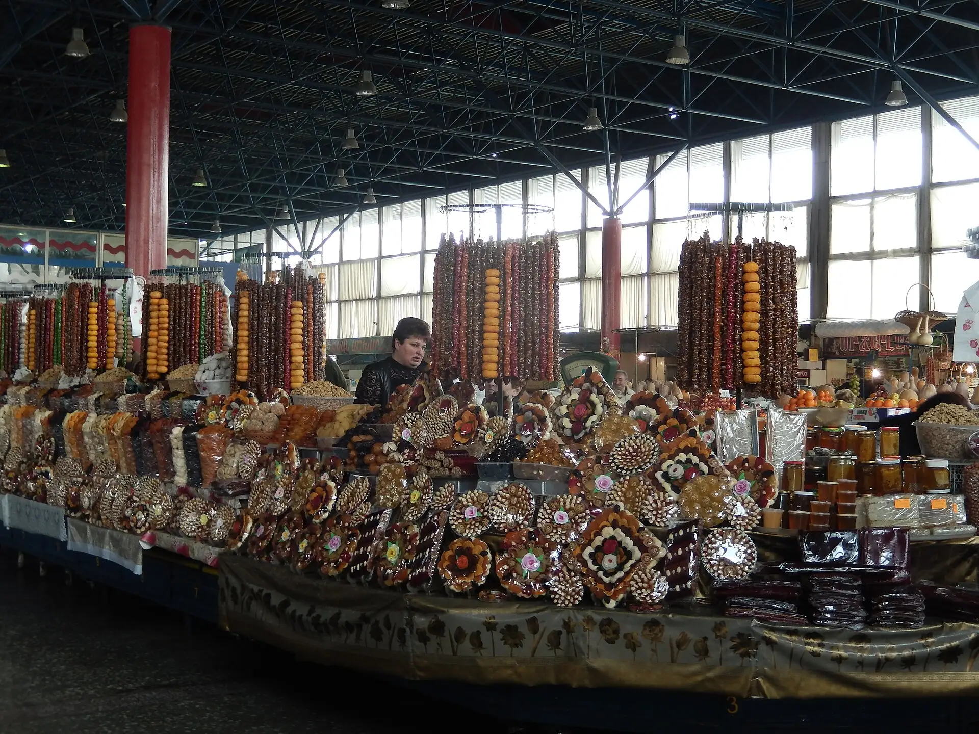 Dried fruit and sujukh stalls inside GUM market in Yerevan