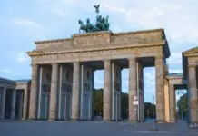 The Brandenburg Gate with the quadriga under a blue morning sky in Berlin