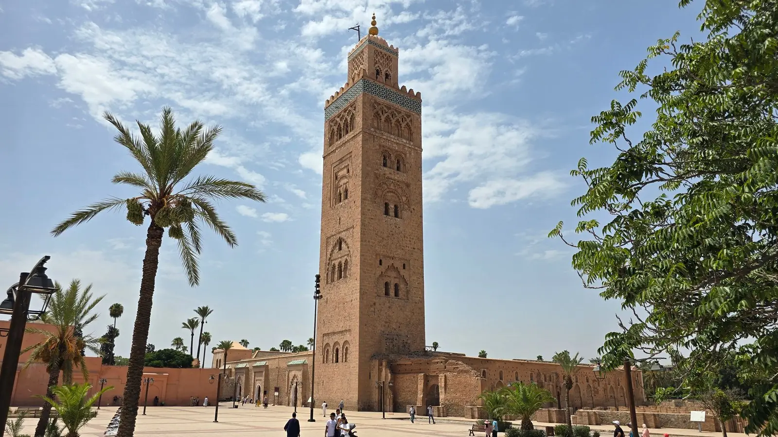 Koutoubia Mosque minaret above the palms in Marrakech on a clear day