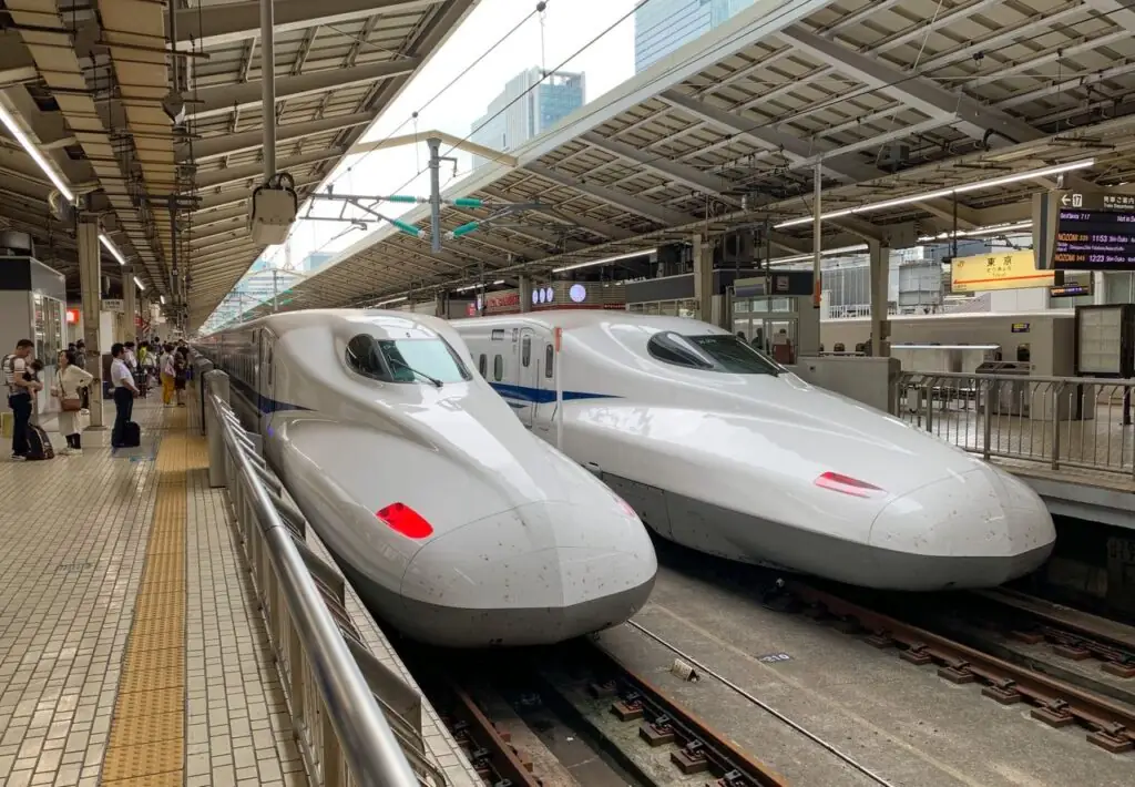 Two Shinkansen bullet trains at a platform of Tokyo Station