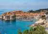 Cheap flights to Dubrovnik: the airport behind the mountain, the city with no railway, and the season that switches the map off Dubrovnik Old Town walls and harbor on the Adriatic