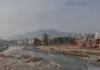 Cheap flights to Kathmandu: the visa you get at the airport, the one-stop menu, and the Everest flight that leaves from a different city Kathmandu river valley with stupa and mountains beyond
