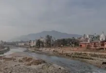 Cheap flights to Kathmandu: the visa you get at the airport, the one-stop menu, and the Everest flight that leaves from a different city Kathmandu river valley with stupa and mountains beyond