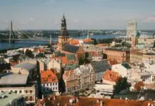 Cheap flights to Riga: the airBaltic hub, the airport 15 minutes out, and one ticket to three capitals Aerial view of Riga Old Town and the Daugava River