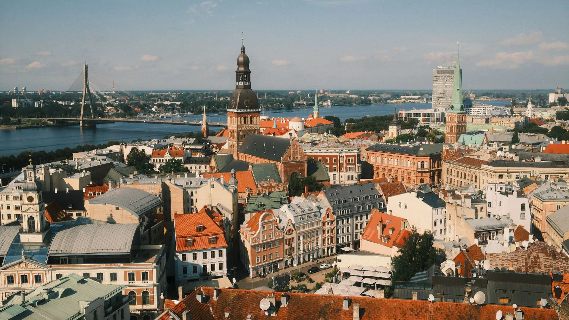 Cheap flights to Riga: the airBaltic hub, the airport 15 minutes out, and one ticket to three capitals Aerial view of Riga Old Town and the Daugava River