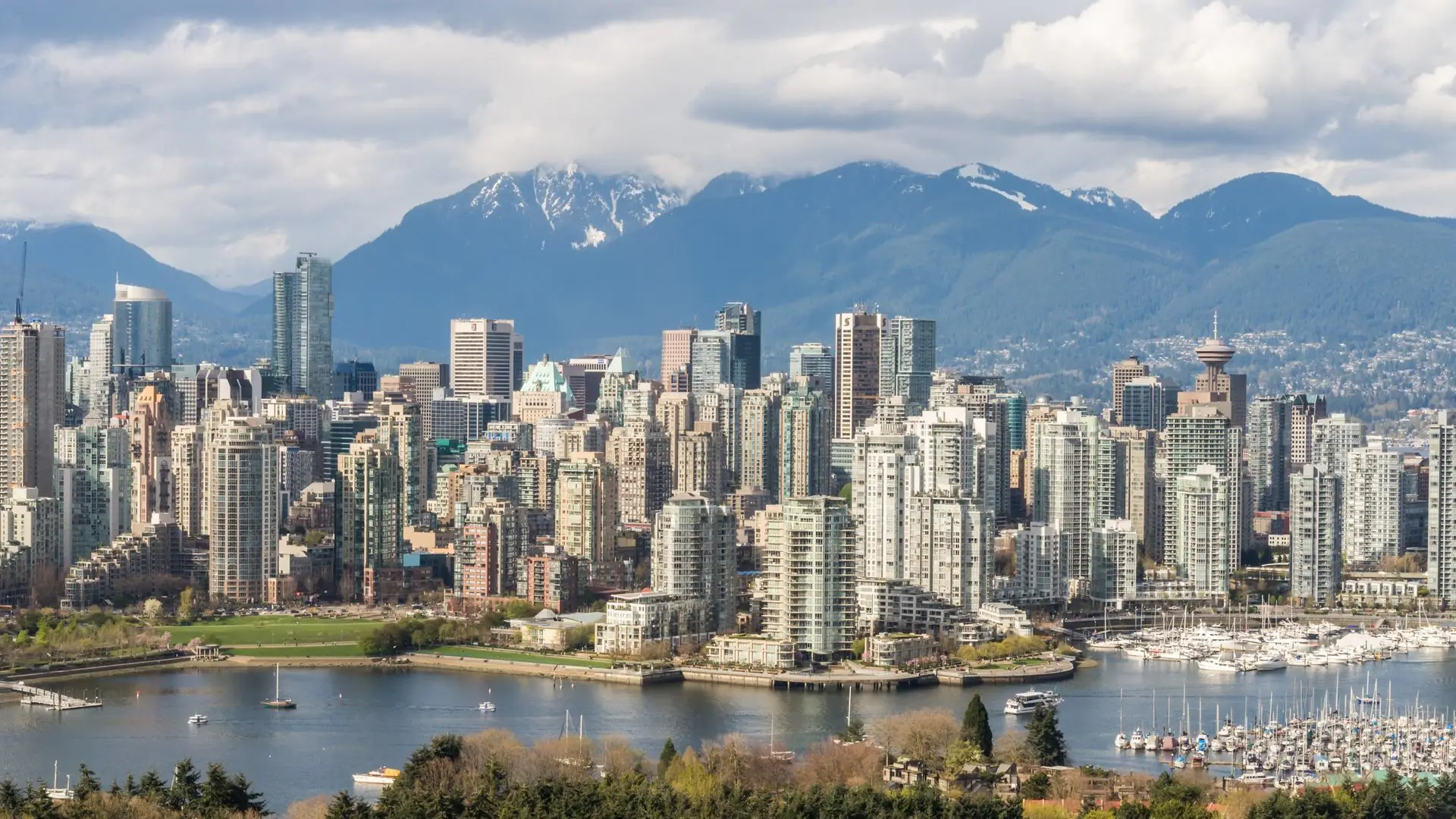 Vancouver skyline with marina and North Shore mountains